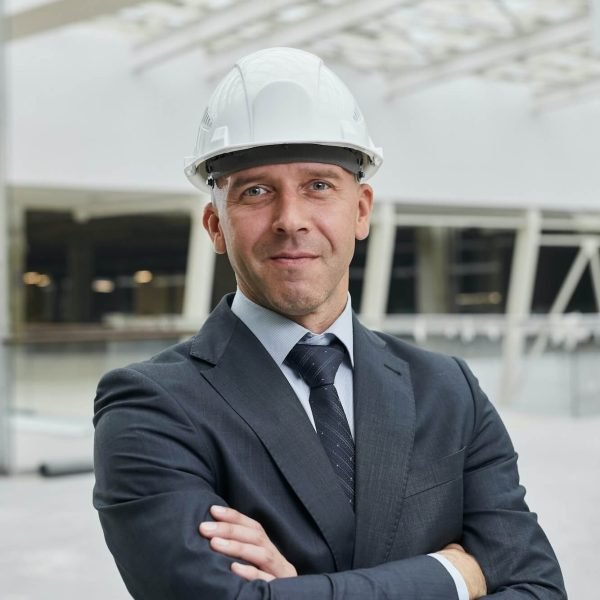 confident-businessman-at-construction-site-1-1.jpg